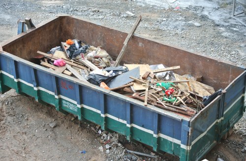 Rubbish removal truck in Colindale